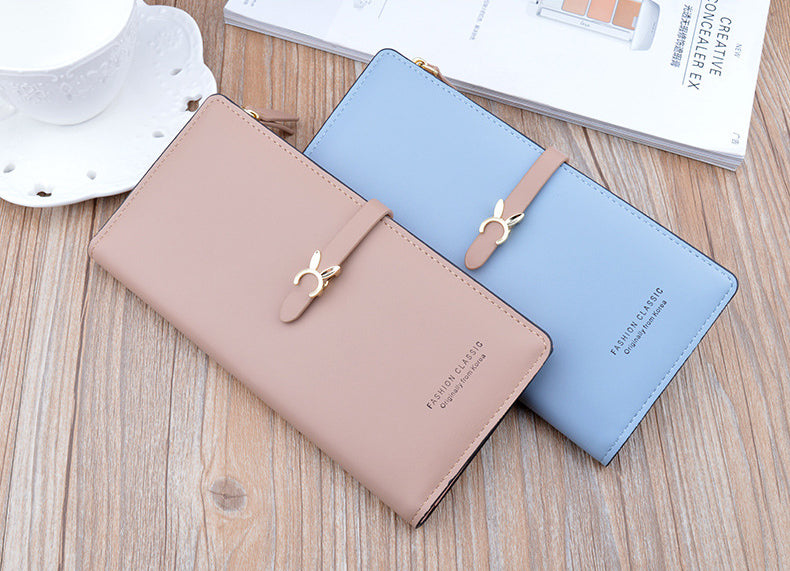 Long wallet purse set, beige and light blue with bow clasps, gold zippers