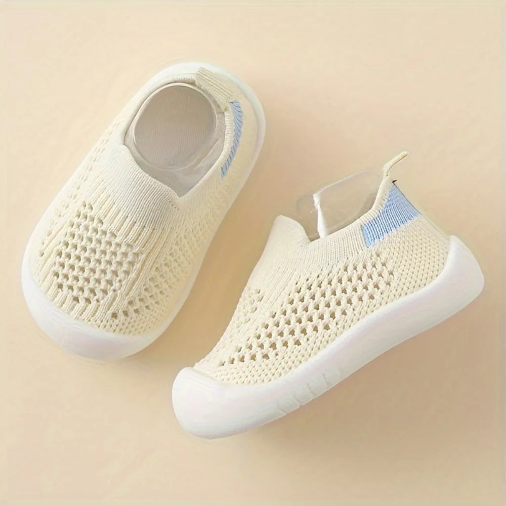 Cream toddler mesh slip-on sandals with breathable knit upper and white sole