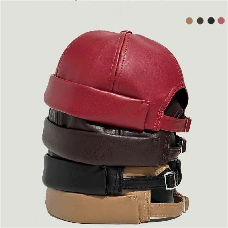 Unisex PU leather docker caps set in red, black, and tan with adjustable straps