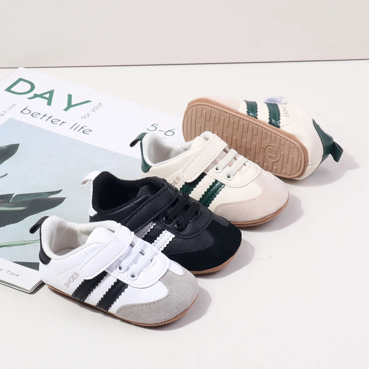Baby first walker sneakers set: white/gray pair and black pair with white side stripes
