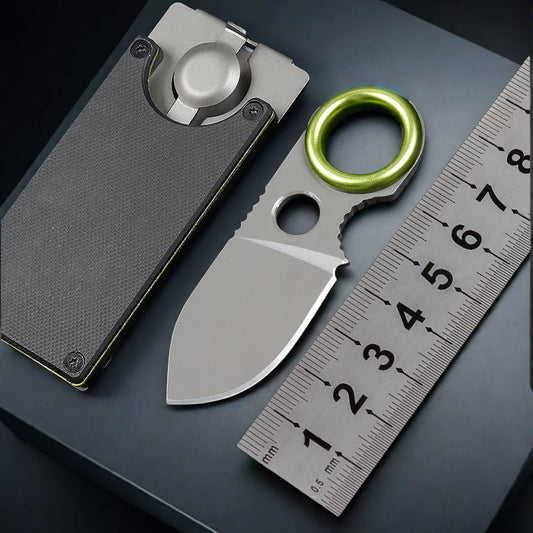 Stainless steel pocket knife keychain with dark handle and green key ring
