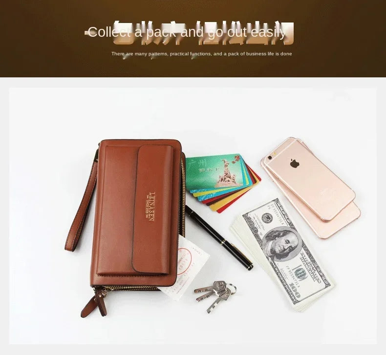 Brown men's wallet clutch with double zipper, money clip, and wrist strap