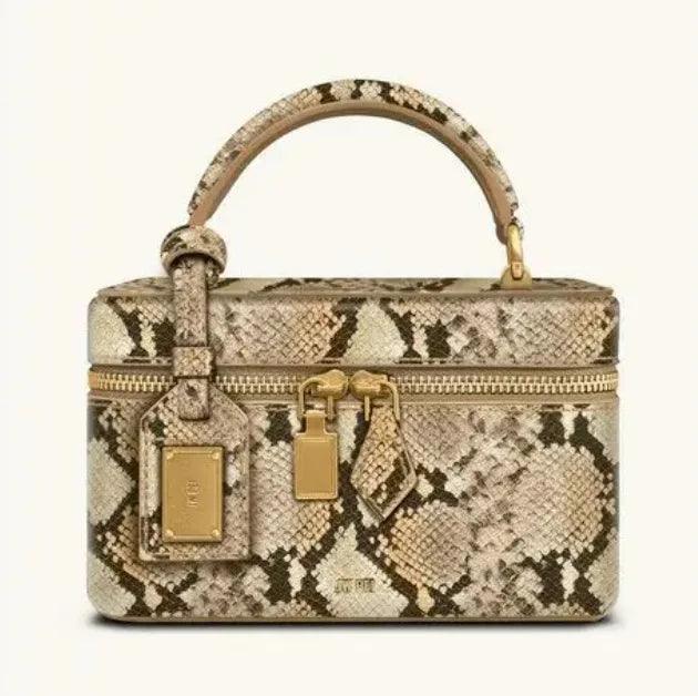 Snakeskin-pattern textured leather crossbody commuter bag with top handle and gold zip