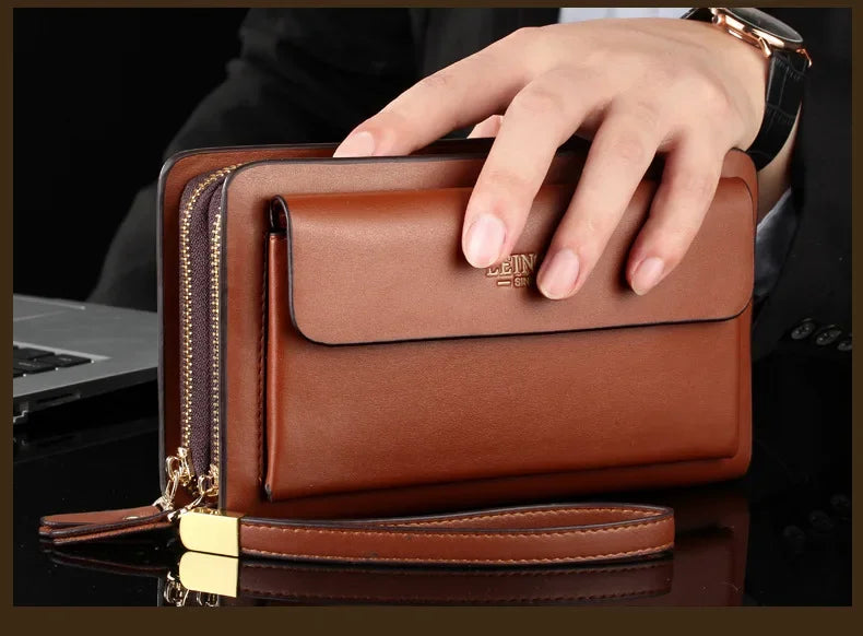 Brown leather-look wallet clutch with front flap and gold-tone money clip