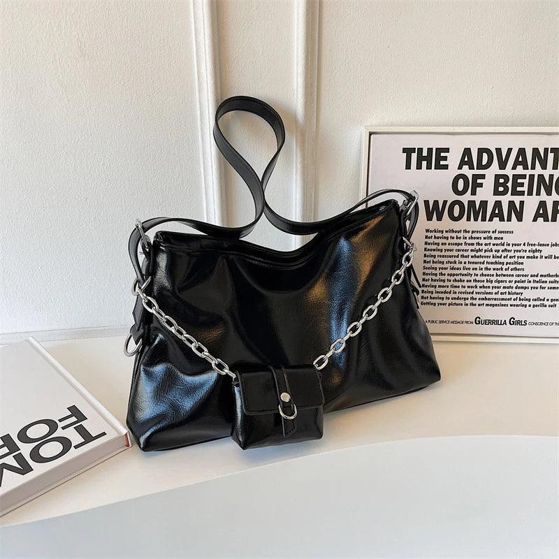 Black PU leather tote bag set with chain handles and front buckle strap pocket