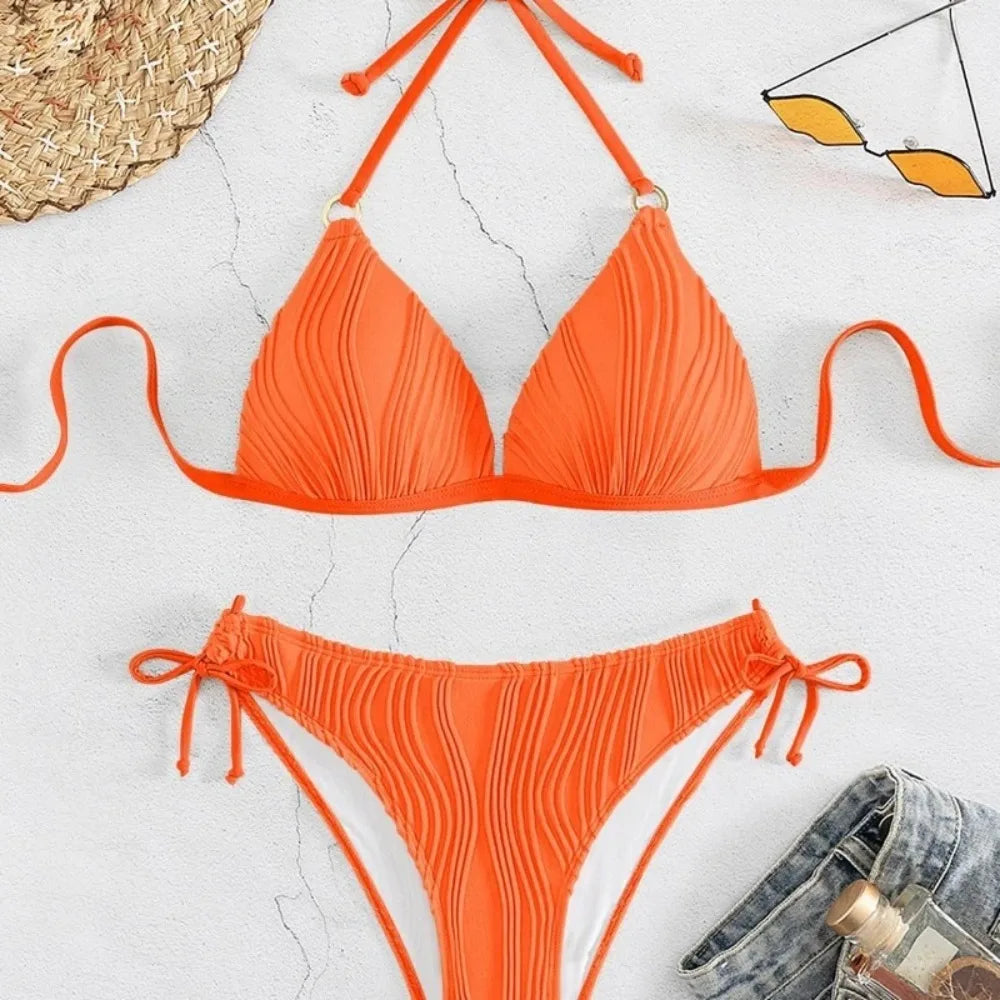 Orange ribbed triangle bikini top and matching high-waist briefs with tie sides