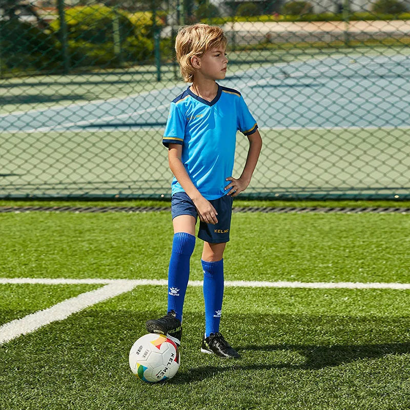 Kids blue soccer jersey and shorts kit, KELME logo